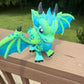 Large blue and green 3D printed articulated western dragon