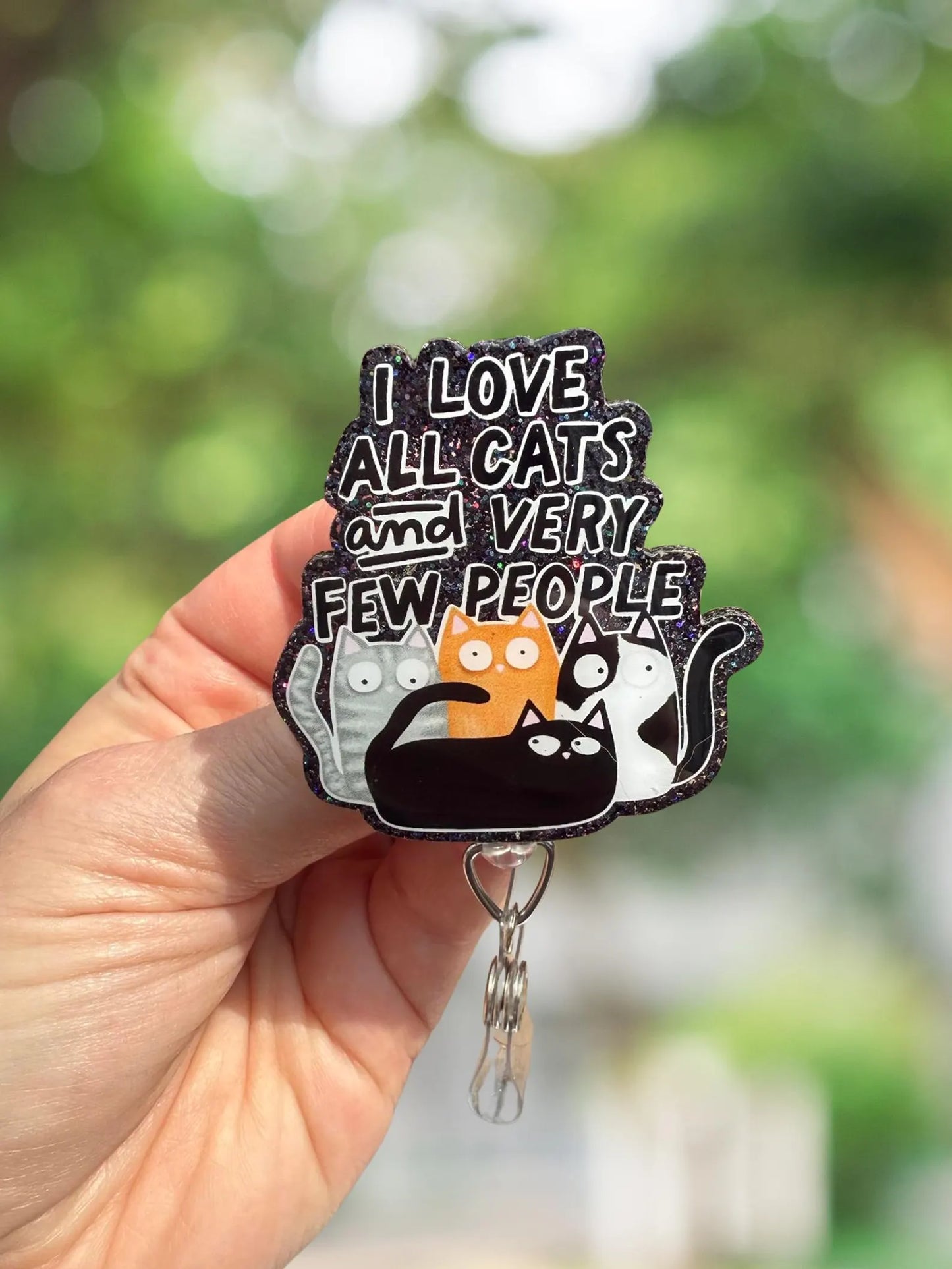 I love cats and very few people retractable badge reel