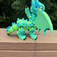 Large blue and green 3D printed articulated western dragon